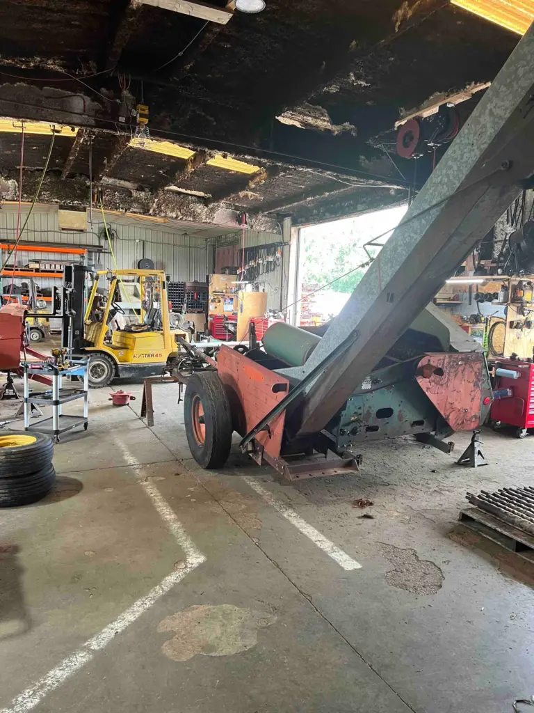 farm equipment in the shop for repairs at Country Machinery