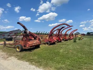 several large pieces of farm equipment from Country Machinery